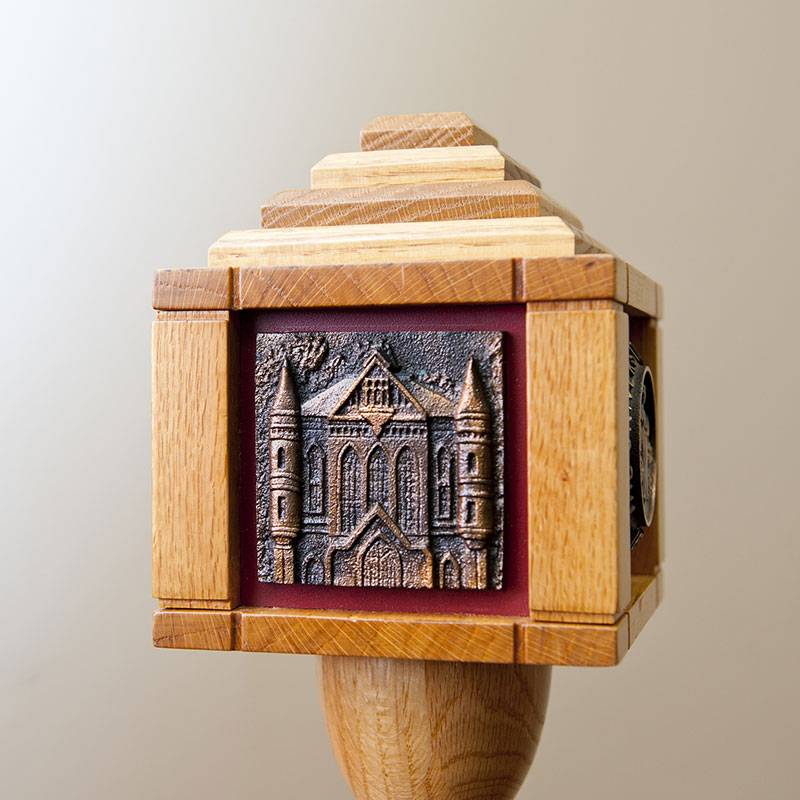 A bronze casting of Clark Hall on The Ceremonial Mace