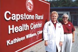 Kathleen Williams, left, and Dr. Jeri Dunkin in front of Parrish health center. 