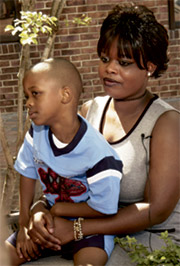 Shomari Thomas, 4, and his mother, LaShondra Cannon, have benefited from Kid One Transport's services. 