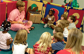CDR trainer Kelly Avery works with children in the on-campus, preschool demonstration classroom. 