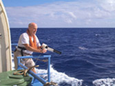 Dr. William Schroeder aboard a vessel off the Australian coast 