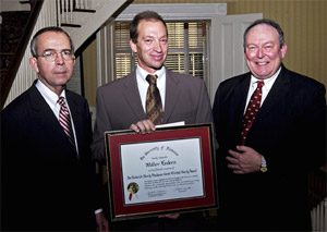 UA President Dr. Robert E. Witt (left) and Frederick Moody Blackmon (right) flank 2004 Blackmon-Moody Award recipient Dr. Walter Enders. 