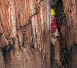 UA graduate student Michael Rasbury returns from a hidden chamber in DeSoto Caverns. (photo: Joe Lambert) 