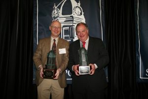 UA Honors College Dean Robert W. Halli Jr. (right) received the 2005 Eugene Current-Garcia Award as Alabama’s Distinguished Literary Scholar. Halli’s former teaching assistant Andrew Hudgins (left) was also honored with the Harper Lee Award for creative writing. 