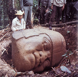 Weighing in at approximately 10 tons, this colossal stone head (shown alongside one of the excavators) was one of the many San Lorenzo artifacts Dr. Richard Diehl assisted in recovering. 