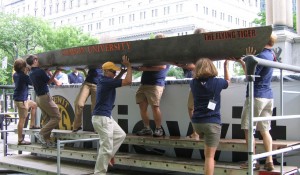 Clemson University's 2008 concrete canoe team swamp tests their boat.