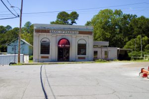 The former Bank of Parrish building sits at the end of Main Street. While road and sidewalk construction in the area indicate progress, this bank location was not too big to fail. 