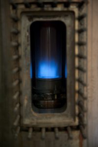 Fuel and air are mixed upstream to produce a clean, blue flame in the combustor. These flames are unlike dirty yellow flames that emit significant amounts of soot, nitric oxides and carbon monoxide. 