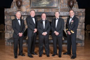 The 2014 Distinguished Engineering Fellows include, from right, Russell S. Hager, Michael C. Simmons, Jerry R. Cook, J. Michael Silva and Rear Adm. Charles A. Richard. 