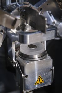 Vaid hopes this unique material, shown here in an X-ray powder diffractometer, will be the active material in a new, improved solar cell (Jeff Hanson). 