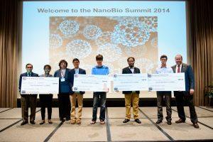 Some of the student winners at the NanoBio Summit stand with representatives of the conference’s steering committee. From left are Dr. Shree Singh, Alabama State University, Dereca Watkins, Dr. Patty Sobecky, UA, Stephen H. Brown, Ben Binderow, Marcus D. Davis, Matthew Eggert, and Dr. Carl Pinkert, UA. 