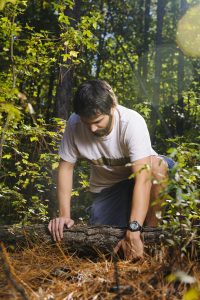 The St. Charles, Missouri native, who recently co-authored a journal article generating much mainstream media attention, looks for salamanders on a recent fall morning. 