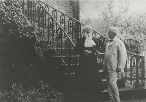 Amelia Gorgas and her son, William, standing on the steps of the Gorgas House, circa 1900. 