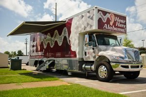 The Hear Here Alabama vehicle is large enough to incorporate a space for physical examinations of the ear, as well as two sound booths to test hearing. 