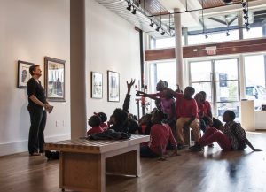 K-12 students visit the Paul R. Jones Gallery of Art. 