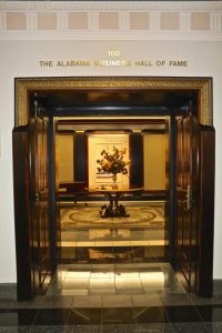 Doors leading into the Alabama Business Hall of Fame at The University of Alabama's Bidgood Hall 