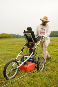 Dr. Virgil Beasley runs Ground Penetrating Radar along a survey transect at the Moundville site (Matthew Wood). 