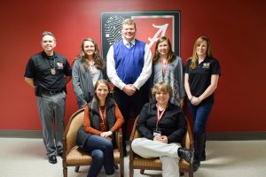 Spring 2015 JECTF interns with law-enforcement officers and Dr. Diana Dolliver, assistant professor in UA’s Department of Criminal Justice. [l-r, back row] UAPD Officer Beau Sams, Carson Collins, UAPD Capt. Clay Hickman, Brice Hill, Dolliver [l-r, front row] Anna Leigh Smith, Rachel Olson