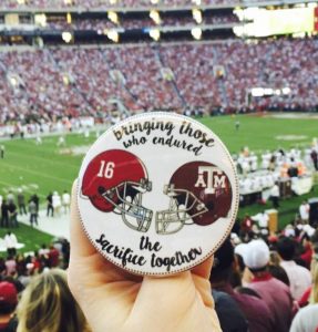 The CVA makes buttons for each Alabama home football game. The CVA doesn't sell the buttons, but they do accept donations. The money they receive helps fund veterans-related activities on campus.