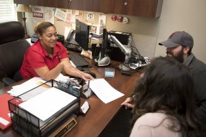 Osielia Lewis, Veterans Military Affairs Specialist, assists students with the procurement and processing of their VA educational benefits.
