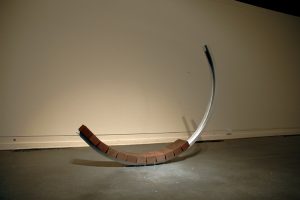 "Equipoise: Segmented Arc," James Alexander. Steel, Firebrick. Approximately 13' by 1' by 2'6" 
