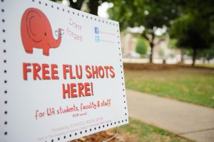 sign offering free flu shots