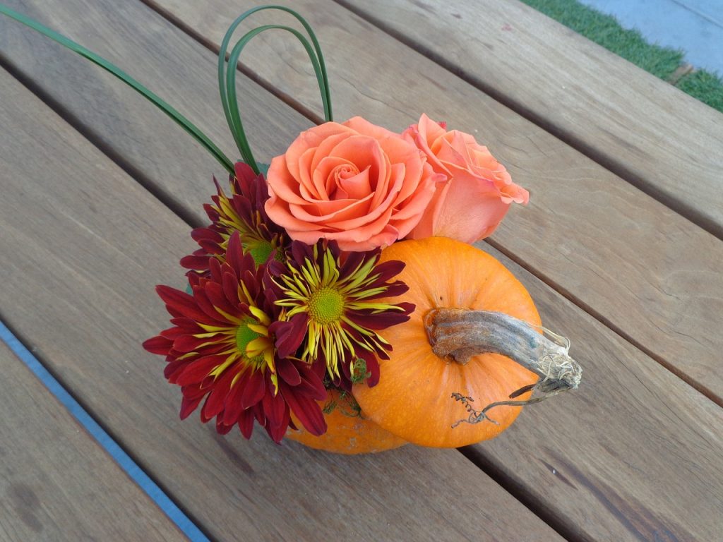 pumpkin and flower table centerpiece