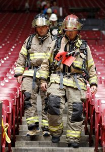 Firefighters walking down stairs