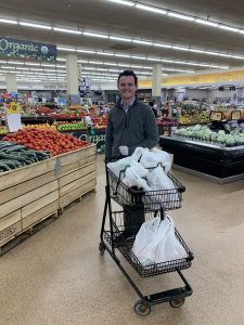 Michael Arundel grocery shopping for senior citizens.