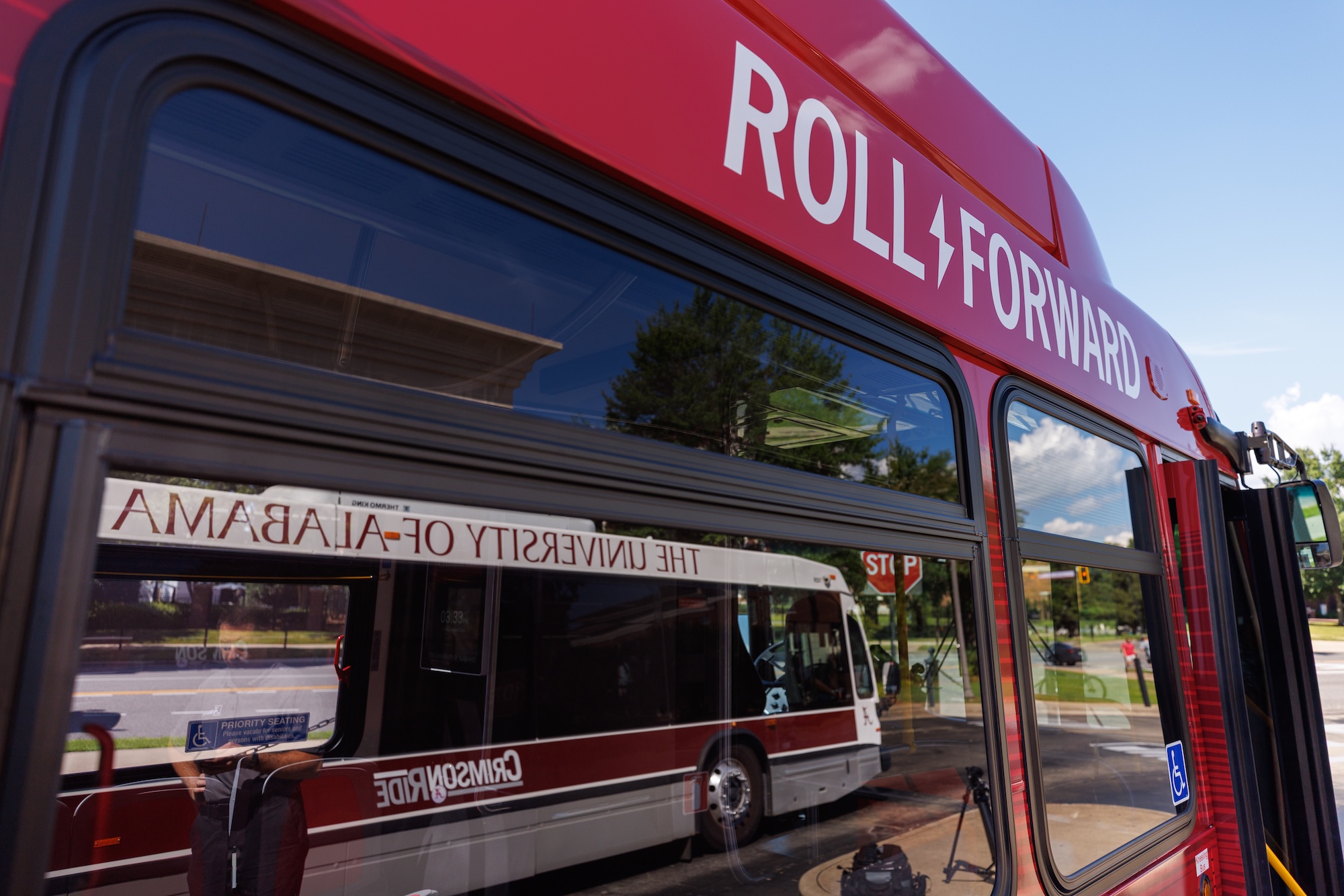 Close-up of a red bus's windows with 